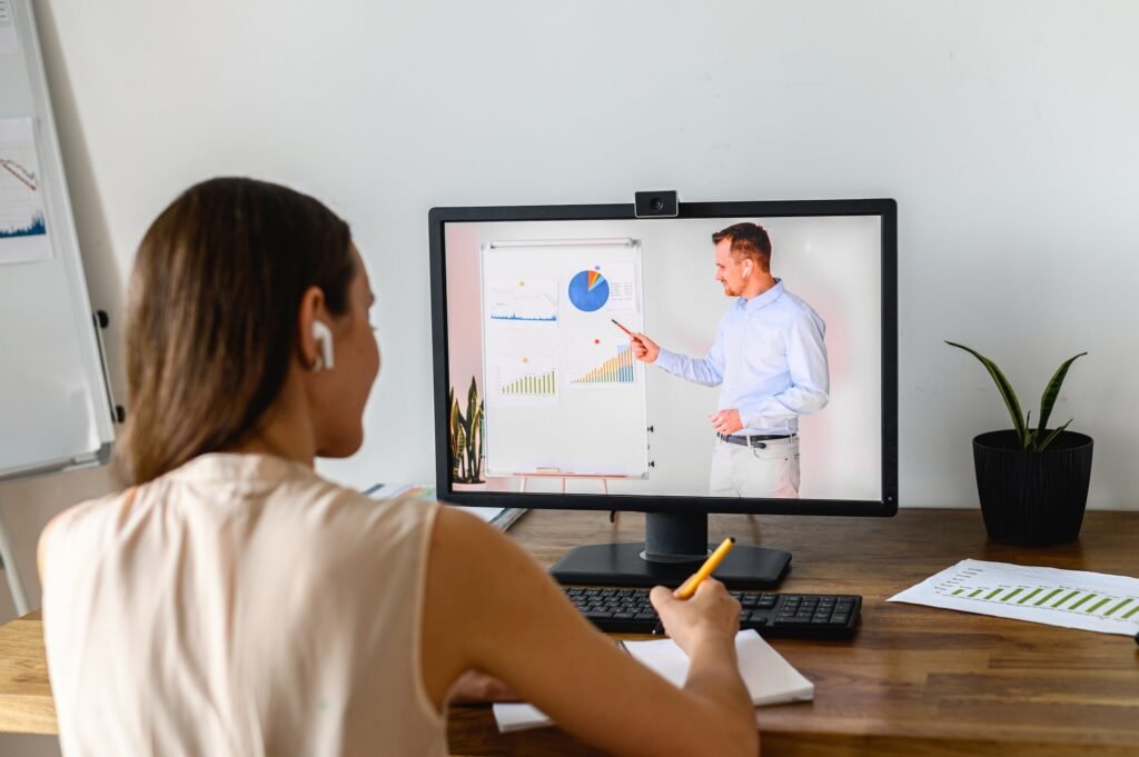 Adult person watching course online