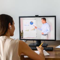 Adult person watching course online