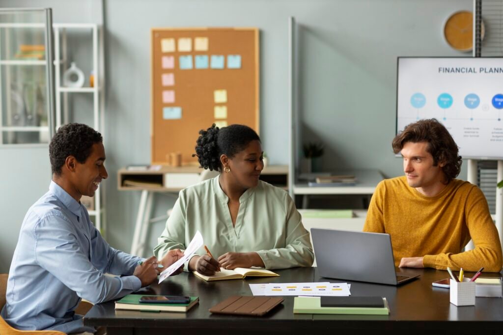 colleagues working office medium shot