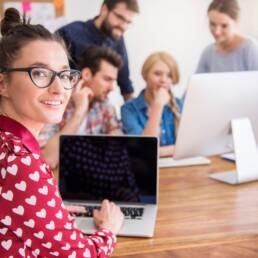 colleagues working office relaxed atmosphere