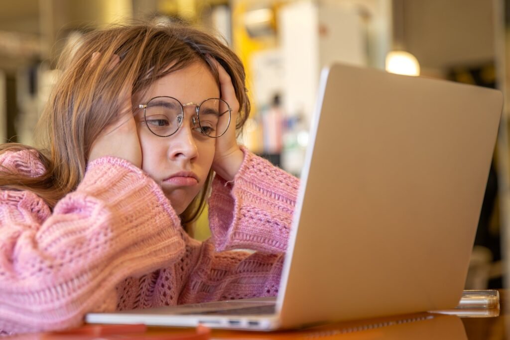 tired teenage girl working laptop online educatio